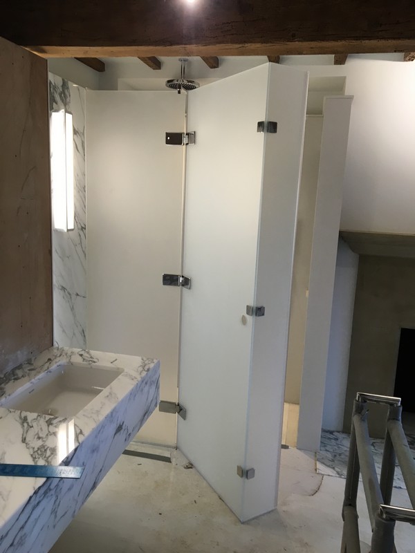 Bespoke frosted glass shower enclosure in Eltham luxury bathroom