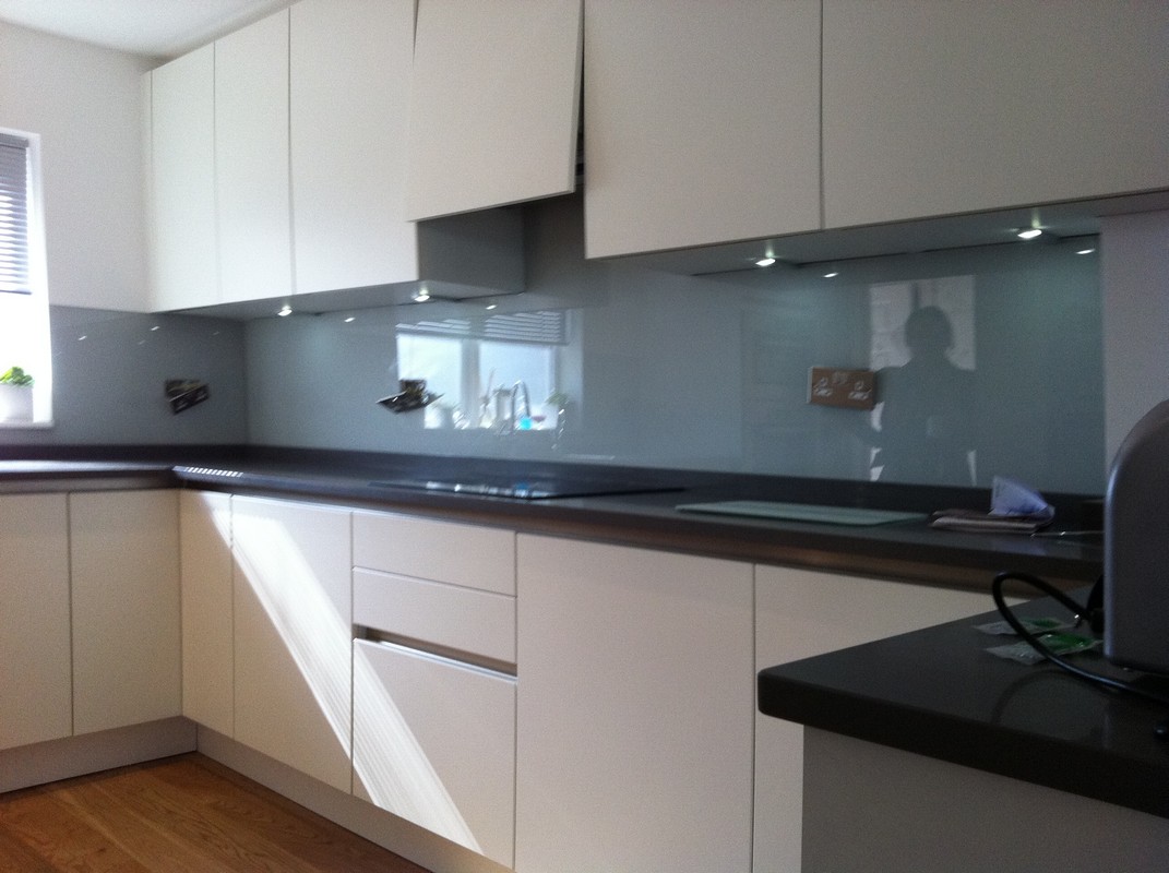 Grey glass kitchen splashback with LED lighting in Eltham
