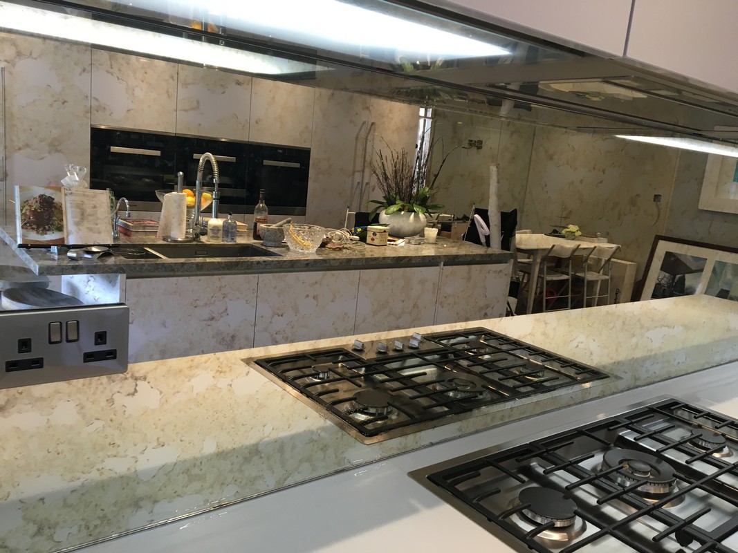 Mirror glass splashback in Eltham luxury kitchen