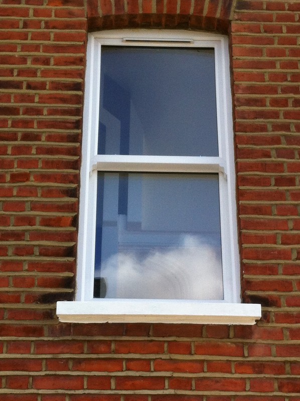 uPVC sash window on Victorian red brick house in Eltham